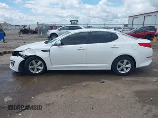 2015 Kia Optima LX with VIN KNAGM4A74F5653459, listed as a IAAI auction lot 42443188 with 109,129 mi miles and . Bid and sale history available at DreamBid. Image 15.