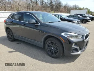 2018 BMW X2 xDrive28i with VIN WBXYJ5C36JEF79315, listed as a Copart auction lot 53993905 with 52,863 mi miles and Salvage Title. Bid and sale history available at carsss.com. Image 4.