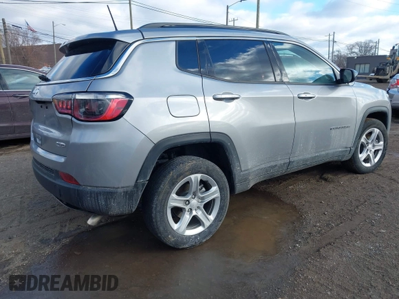 2023 Jeep Compass Latitude with VIN 3C4NJDBN7PT532099, listed as a IAAI auction lot 41485624 with 10,564 mi miles and . Bid and sale history available at DreamBid. Image 4.