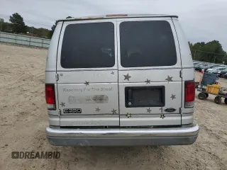 1999 Ford Econoline Passenger XL with VIN 1FBSS31L2XHB54786, listed as a Copart auction lot 80025474 with 418,665 mi miles and Clean Title. Bid and sale history available at DreamBid. Image 6.