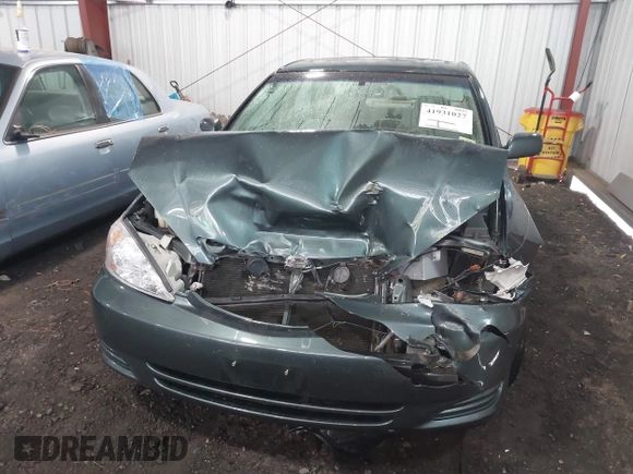 2004 Toyota Camry LE with VIN 4T1BE30K54U377818, listed as a IAAI auction lot 41931027 with 212,690 mi miles. Bid and sale history available at carsss.com. Image 6.