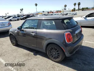 2014 MINI Hardtop with VIN WMWXM5C57ET934120, listed as a Copart auction lot 58594845 with 115,248 mi miles and Salvage title. Bid and sale history available at DreamBid. Image 2.