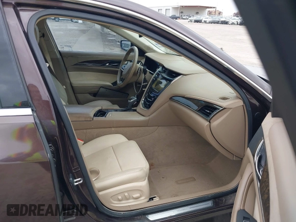 2016 Cadillac CTS Luxury Collection RWD z VIN 1G6AR5SX7G0111806, wystawiony jako IAAI lot #41908192 z przebiegiem 86 309 mil mil oraz . Historia ofert i sprzedaży dostępna na DreamBid. Obrazek 5.