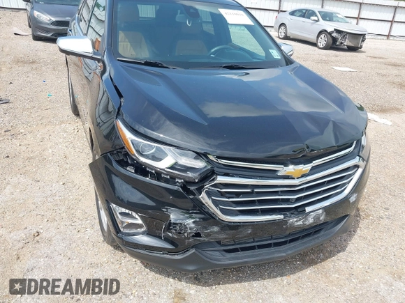 2021 Chevrolet Equinox Premier with VIN 2GNAXNEV5M6151910, listed as a IAAI auction lot 42110010 with 45,911 mi miles and . Bid and sale history available at DreamBid. Image 6.