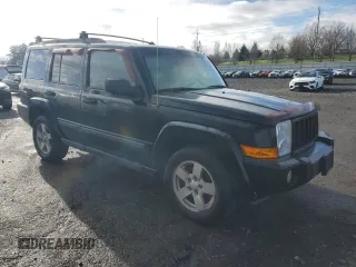2006 Jeep Commander with VIN 1J8HG48N26C192396, listed as a Copart auction lot 48846325 with 242,544 mi miles and Salvage title. Bid and sale history available at DreamBid. Image 4.