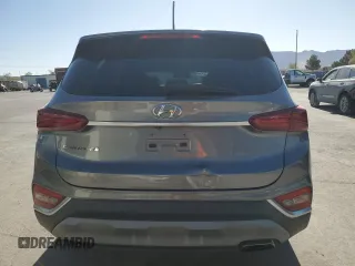 2019 Hyundai Santa Fe SE z VIN 5NMS23AD9KH043292, wystawiony jako Copart lot #54108685 z przebiegiem 27 474 mil mil oraz Szkoda całkowita • Salvage title. Historia ofert i sprzedaży dostępna na DreamBid. Obrazek 6.