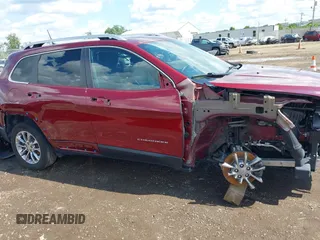 2019 Jeep Cherokee Latitude Plus z VIN 1C4PJLLN2KD147453, wystawiony jako IAAI lot #42552461 z przebiegiem 84 456 mil mil oraz . Historia ofert i sprzedaży dostępna na DreamBid. Obrazek 14.