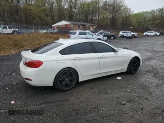 2019 BMW 4 Series 430i xDrive with VIN WBA4J3C55KBL04971, listed as a Copart auction lot 52088445 with 112,353 mi miles and Clean Title. Bid and sale history available at carsss.com. Image 3.