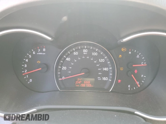 2014 Kia Sorento LX z VIN 5XYKT3A67EG461489, wystawiony jako Copart lot #57498295 z przebiegiem 198 799 mil mil oraz Szkoda całkowita • Salvage title. Historia ofert i sprzedaży dostępna na DreamBid. Obrazek 9.