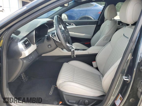 2023 Genesis G70 2.0T with VIN KMTG34TA4PU120566, listed as a Copart auction lot 53307455 with 31,933 mi miles and Salvage title. Bid and sale history available at DreamBid. Image 7.