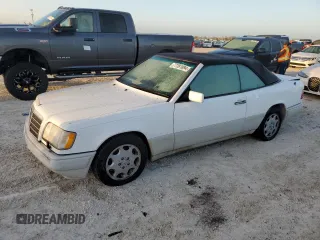 1995 Mercedes-Benz E Class with VIN WDBEA66E0SC275229, listed as a Copart auction lot 77391894 with 64,025 mi miles and Salvage Title. Bid and sale history available at carsss.com. Image 1.