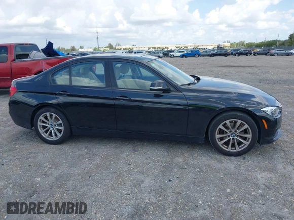 2018 BMW 3 Series 320i with VIN WBA8E1G57JNU88781, listed as a IAAI auction lot 42019246 with 56,820 mi miles. Bid and sale history available at carsss.com. Image 14.