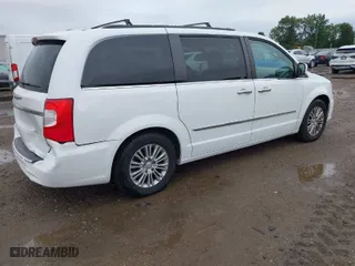 2015 Chrysler Town & Country Touring-L with VIN 2C4RC1CG6FR693233, listed as a IAAI auction lot 40095750 with 149,563 mi miles. Bid and sale history available at carsss.com. Image 4.