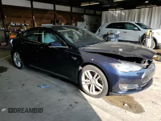 2014 Tesla Model S 60 with VIN 5YJSA1H16EFP43523, listed as a Copart auction lot 63291145 with Not provided miles and Clean title. Bid and sale history available at DreamBid. Image 4.