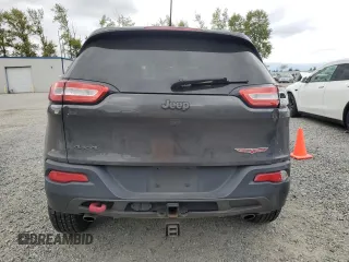 2017 Jeep Cherokee Trailhawk z VIN 1C4PJMBS0HW577055, wystawiony jako Copart lot #56428235 z przebiegiem 137 296 mil mil oraz Szkoda całkowita • Salvage title. Historia ofert i sprzedaży dostępna na DreamBid. Obrazek 6.