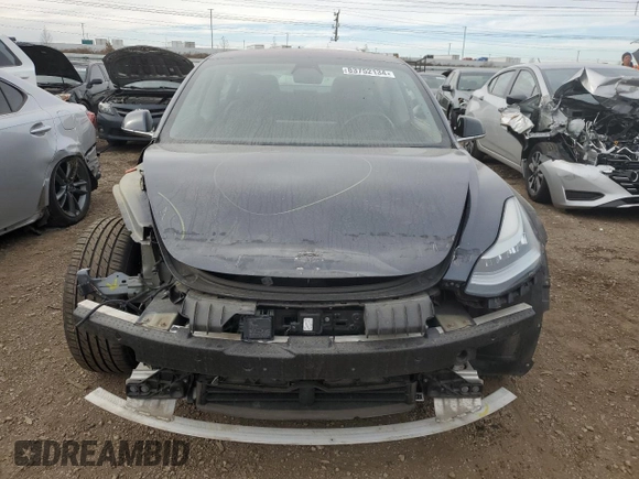 2018 Tesla Model 3 Long Range Battery z VIN 5YJ3E1EB3JF103804, wystawiony jako Copart lot #83752134 z przebiegiem 128 507 mil mil oraz Szkoda całkowita • Salvage title. Historia ofert i sprzedaży dostępna na DreamBid. Obrazek 5.