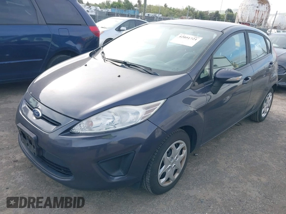 2013 Ford Fiesta SE with VIN 3FADP4EJ6DM205708, listed as a IAAI auction lot 42051721 with 139,143 mi miles. Bid and sale history available at carsss.com. Image 2.