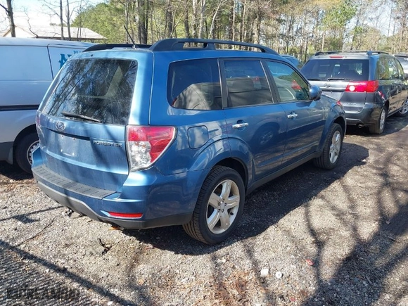 2009 Subaru Forester (Natl) X w/Prem/All-Weather with VIN JF2SH63699H720904, listed as a IAAI auction lot 41935442 with 148,380 mi miles. Bid and sale history available at carsss.com. Image 4.
