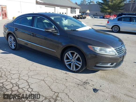 2013 Volkswagen CC Lux with VIN WVWRP7ANXDE522469, listed as a IAAI auction lot 41413025 with 115,117 mi miles. Bid and sale history available at carsss.com. Image 1.
