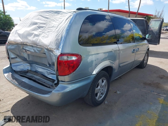 2005 Dodge Caravan SXT with VIN 2D4GP44L75R193138, listed as a IAAI auction lot 42073429 with 206,915 mi miles and . Bid and sale history available at DreamBid. Image 4.