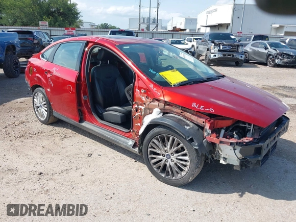 2018 Ford Focus Titanium with VIN 1FADP3J20JL281141, listed as a IAAI auction lot 42437424 with 113,499 mi miles and . Bid and sale history available at DreamBid. Image 1.