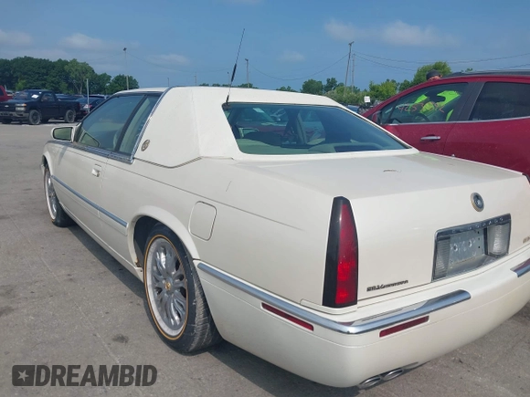 2001 Cadillac Eldorado ESC with VIN 1G6EL12Y01B104230, listed as a IAAI auction lot 42521397 with 60,570 mi miles and . Bid and sale history available at DreamBid. Image 3.