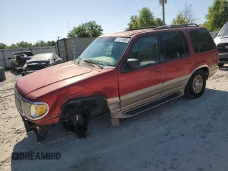 2000 Mercury Mountaineer z VIN 4M2ZU66E3YUJ00805, wystawiony jako Copart lot #53512655 z przebiegiem 157 577 mil mil oraz Szkody całkowita. Historia ofert i sprzedaży dostępna na DreamBid. Obrazek 1.