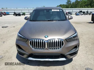 2020 BMW X1 xDrive28i z VIN WBXJG9C09L5R23653, wystawiony jako Copart lot #52771535 z przebiegiem 54 550 mil mil oraz Szkody całkowita. Historia ofert i sprzedaży dostępna na DreamBid. Obrazek 5.
