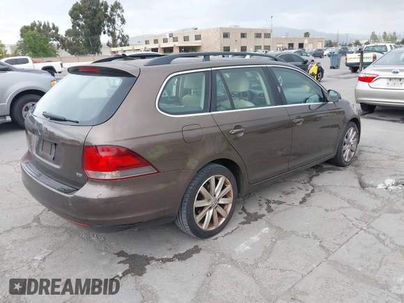 2012 Volkswagen Jetta SportWagen TDI with VIN 3VWPL7AJ1CM602054, listed as a IAAI auction lot 42138739 with 140,202 mi miles. Bid and sale history available at carsss.com. Image 4.