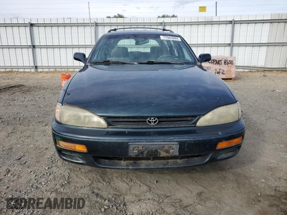 1995 Toyota Camry LE z VIN 4T1GK12W4SU079938, wystawiony jako Copart lot #77065084 z przebiegiem 222 731 mil mil oraz Szkoda całkowita • Salvage title. Historia ofert i sprzedaży dostępna na DreamBid. Obrazek 5.