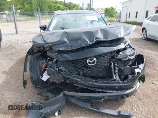 2024 Mazda CX-50 S Premium with VIN 7MMVABDM0RN185128, listed as a IAAI auction lot 42383177 with 21,267 mi miles and . Bid and sale history available at DreamBid. Image 12.
