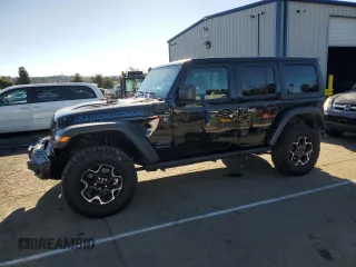 2023 Jeep Wrangler Rubicon z VIN 1C4JJXR64PW700712, wystawiony jako Copart lot #87885715 z przebiegiem 16 112 mil mil oraz Szkoda całkowita • Salvage title. Historia ofert i sprzedaży dostępna na DreamBid. Obrazek 1.