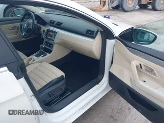 2011 Volkswagen CC Sport z VIN WVWMN7AN2BE711744, wystawiony jako IAAI lot #42416773 z przebiegiem 142 029 mil mil oraz . Historia ofert i sprzedaży dostępna na DreamBid. Obrazek 5.