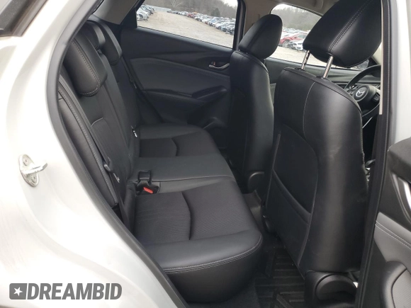 2019 Mazda CX-3 Touring with VIN JM1DKFC78K0405131, listed as a Copart auction lot 87065614 with 91,091 mi miles and Salvage Title. Bid and sale history available at carsss.com. Image 11.