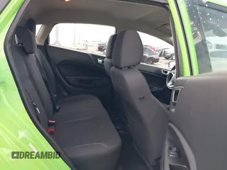 2014 Ford Fiesta SE z VIN 3FADP4EJ8EM233754, wystawiony jako IAAI lot #42108955 z przebiegiem 113 325 mil mil oraz . Historia ofert i sprzedaży dostępna na DreamBid. Obrazek 8.