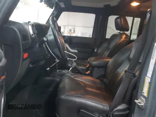 2013 Jeep Wrangler Unlimited Rubicon with VIN 1C4BJWFG7DL691514, listed as a Copart auction lot 42449245 with 114,640 mi miles and Salvage Title. Bid and sale history available at carsss.com. Image 7.