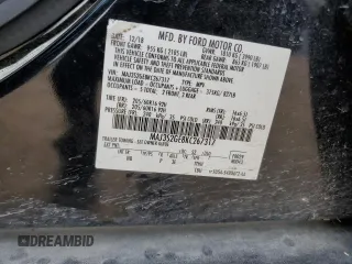 2019 Ford EcoSport SE z VIN MAJ3S2GE8KC267317, wystawiony jako Copart lot #53885175 z przebiegiem 51 737 mil mil oraz Szkody całkowita. Historia ofert i sprzedaży dostępna na DreamBid. Obrazek 13.