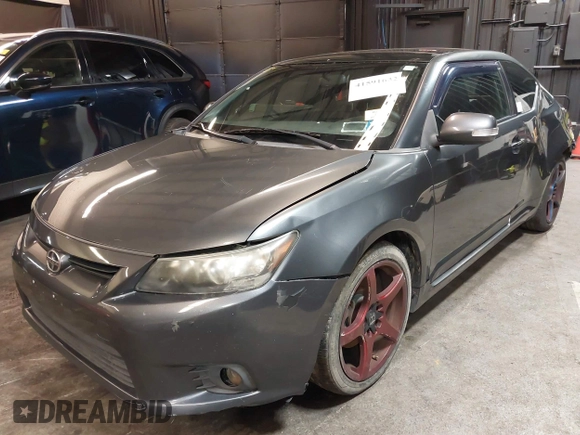 2012 Scion tC with VIN JTKJF5C7XC3034998, listed as a IAAI auction lot 41591632 with 171,121 mi miles. Bid and sale history available at carsss.com. Image 18.