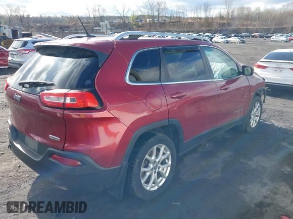 2014 Jeep Cherokee Latitude z VIN 1C4PJMCSXEW141453, wystawiony jako IAAI lot #41975311 z przebiegiem 150 085 mil mil oraz . Historia ofert i sprzedaży dostępna na DreamBid. Obrazek 4.