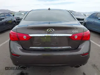 2015 Infiniti Q50 with VIN JN1BV7AP7FM349885, listed as a IAAI auction lot 42249063 with 76,089 mi miles and . Bid and sale history available at DreamBid. Image 16.