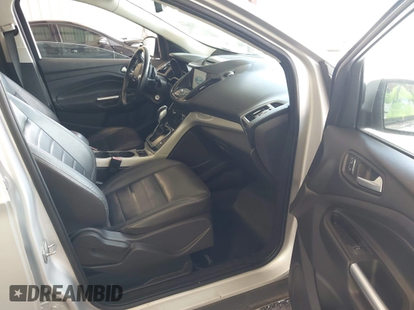 2013 Ford Escape SEL z VIN 1FMCU9HX0DUB99150, wystawiony jako IAAI lot #42812971 z przebiegiem 212 298 mil mil oraz . Historia ofert i sprzedaży dostępna na DreamBid. Obrazek 5.