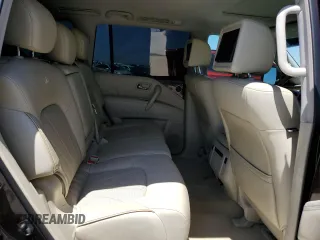 2012 Infiniti QX56 8-passenger z VIN JN8AZ2NC0C9316897, wystawiony jako Copart lot #57865465 z przebiegiem 96 031 mil mil oraz Czysty tytuł • Clean title. Historia ofert i sprzedaży dostępna na DreamBid. Obrazek 11.