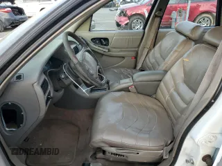 1996 Buick Regal with VIN 2G4WF52KXT1512650, listed as a Copart auction lot 79048884 with 225,558 mi miles and Salvage Title. Bid and sale history available at DreamBid. Image 7.