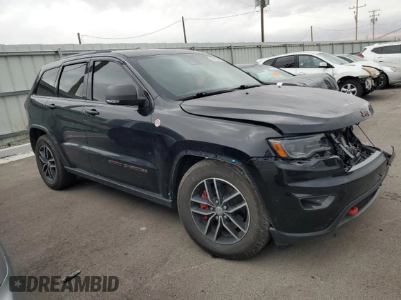 2017 Jeep Grand Cherokee Trailhawk with VIN 1C4RJFLT5HC692439, listed as a Copart auction lot 81093534 with 135,493 mi miles and Salvage title. Bid and sale history available at DreamBid. Image 4.
