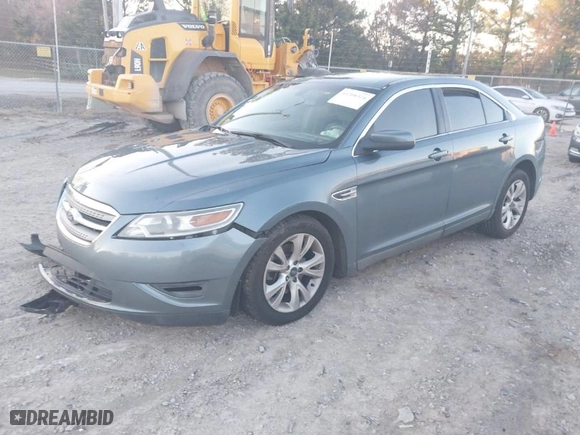 2010 Ford Taurus SEL with VIN 1FAHP2EW3AG153350, listed as a IAAI auction lot 41208324 with 171179 miles. Bid and sale history available at carsss.com. Image 2.