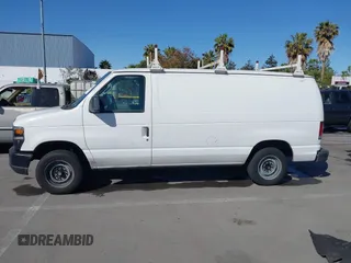 2013 Ford Econoline Cargo Commercial with VIN 1FTNE1EW7DDA98789, listed as a IAAI auction lot 42382594 with 251,602 mi miles and . Bid and sale history available at DreamBid. Image 14.