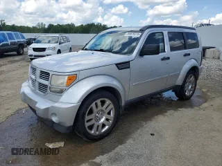 2011 Dodge Nitro Heat with VIN 1D4PU4GK0BW604975, listed as a Copart auction lot 56979275 with 160,494 mi miles and Salvage title. Bid and sale history available at DreamBid. Image 1.