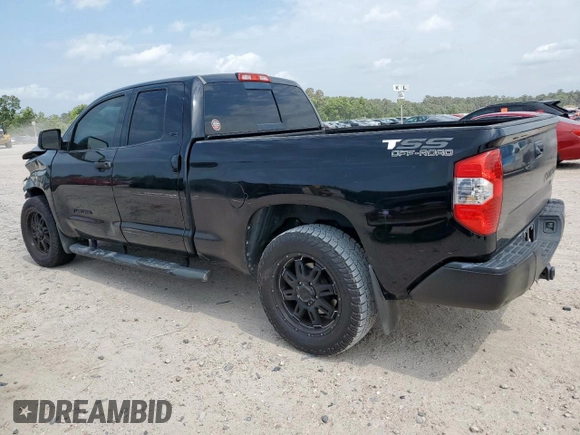 2014 Toyota Tundra SR с VIN 5TFRM5F12EX071952, выставлен на аукционе Copart как лот 57252215 с пробегом 143 706 миль миль и Списание • Salvage title. История ставок и продаж доступна на DreamBid. Изображение 2.