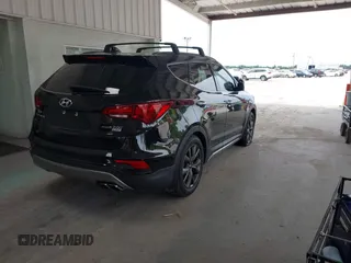 2018 Hyundai Santa Fe Ultimate z VIN 5NMZW4LA6JH054308, wystawiony jako IAAI lot #42385503 z przebiegiem 108 004 mil mil oraz . Historia ofert i sprzedaży dostępna na DreamBid. Obrazek 4.