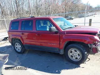 2014 Jeep Patriot Sport with VIN 1C4NJPBA5ED689986, listed as a IAAI auction lot 41701397 with 155,242 mi miles and . Bid and sale history available at carsss.com. Image 13.